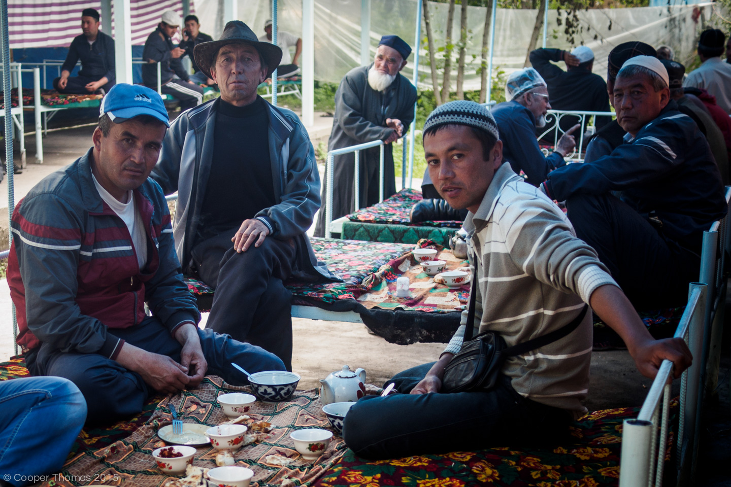 Locals enjoying a typical chaikhana lunch of meat, bread, and tea